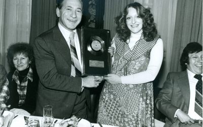 Louis Benjimen Chairman of Pye Records/ATV presents Kelly Marie with gold disc